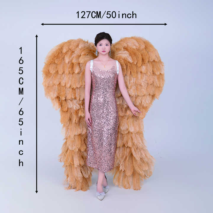 Yellow high-quality ostrich feather angel wings. They are role-playing prop costumes used for modeling shows and wedding photography.